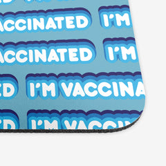 A close-up of a blue classic mousepad with a blue and white bubble text pattern. The text that reads “I’m Vaccinated” is in white. Each of these has blue behind them, from the lightest shade to the darkest shade.