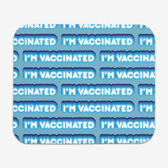 A blue classic mousepad with a blue and white bubble text pattern. The text that reads “I’m Vaccinated” is in white. Each of these has blue behind them, from the lightest shade to the darkest shade.