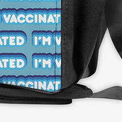 A close-up of a blue gaming crate with a blue and white bubble text pattern. The text that reads “I’m Vaccinated” is in white. Each of these has blue behind them, from the lightest shade to the darkest shade.