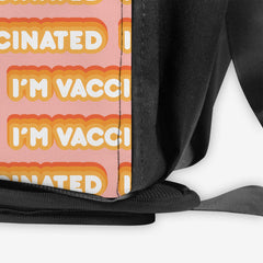 A close-up of a pink gaming crate with an orange and white bubble text pattern. The text that reads “I’m Vaccinated” is in white. Each of these has orange behind them, from the lightest shade to the darkest shade.orange and white bubble text pattern. The text that reads “I’m Vaccinated” is in white. Each of these has orange behind them, from the lightest shade to the darkest shade.