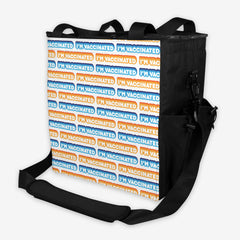 A side view of a white gaming crate with an orange, blue, and white bubble text pattern. The text that reads “I’m Vaccinated” is in white. Each of these has orange or blue behind them, from the lightest shade to the darkest shade.