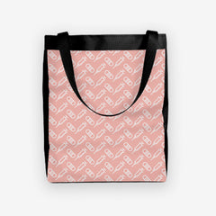 A pink day tote with a white pattern of bandages and vaccines.