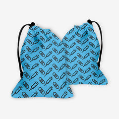 A front and back side of a blue dice bag with a black pattern of bandages and vaccines.