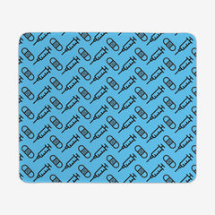 A blue large gaming mousepad with a black pattern of bandages and vaccines