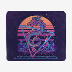 Large gaming mousepad of Retrwowave Dragon by TechraNova. A purple dragon wearing sunglasses flies through a triangle with a sunset behind it.