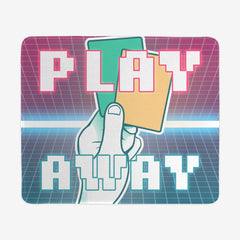 Large mousepad of Play Away Logo by The Pioneer Perspective. A hand holds up two paying cards one is yellow the other is green. Behind the hand is a pink and blue gridded background. In front of the had is text that reads "Play Away".