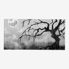 Forgotten Dimension by Valiant Areth. Spooky tree in the rain shows a moon in the left corner. Black and grey.