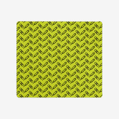 A green extra large gaming mousepad with a black pattern of bandages and vaccines