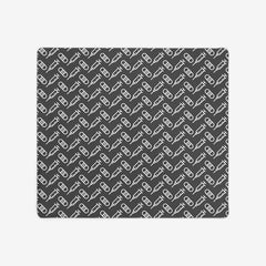 A grey extra large gaming mousepad with a white pattern of bandages and vaccines