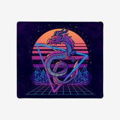Extra large gaming mousepad of Retrwowave Dragon by TechraNova. A purple dragon wearing sunglasses flies through a triangle with a sunset behind it.