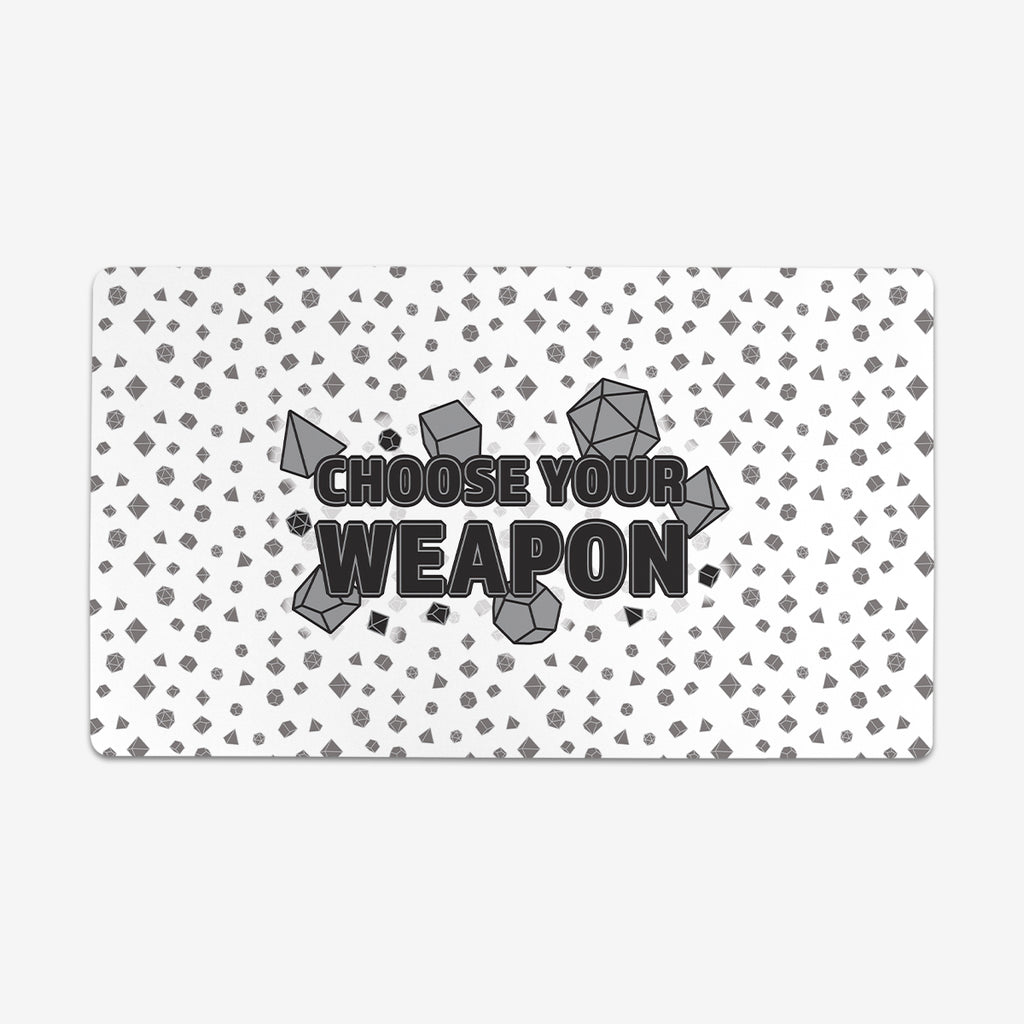 Black and white version of Choose Your Weapon by Inked Gaming. Text saying "Choose Your Weapon" sits at the center of this playmat. Large dice are coming out from behind the letters, and smaller dice create a pattern in the background.