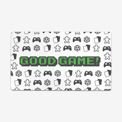 Green version of Good Game by Inked Gaming. Dice, cards, gaming controllers, and tokens make a pattern around text that says "Good Game" in the center of this playmat.
