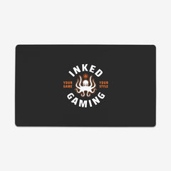 Inked Gaming Logo in the color coral. Coral is an orange color.