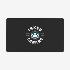 Inked Gaming Logo in the color open seas. Open seas is a light blue color.