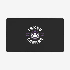 Inked Gaming Logo in the color urchin. Urchin is a purple color.