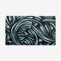 Playmat of Follow Me by Michael Lang. Swirls of black, white, and grey create an abstract pattern.