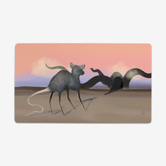 Desert Rat by Morgan Hawthorn. Large grey rat looks at tentacles in a desert.